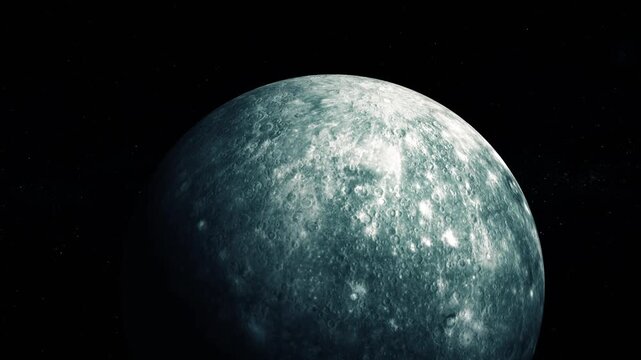 A detailed cratered moon or planet seen against a dark space background, showing a bright lit edge and textured surface