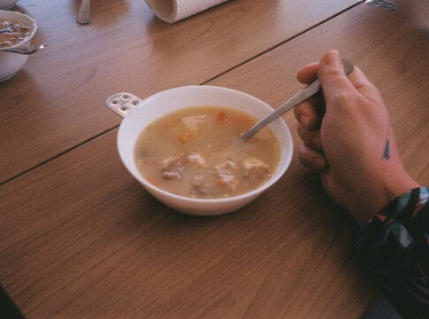 Warm bowl of soup enjoyed indoors during evening gathering