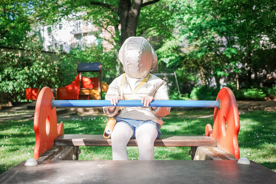 Child Plays at a Park alone
