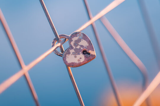 Romantic love padlocks two heart shaped locks pink bokeh symbol eternal love couples valentine commitment. Conceptual love travel scene. Wedding anniversary romance couples devotion symbol wall art