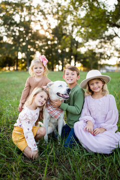 Sweet Siblings With Their Dog
