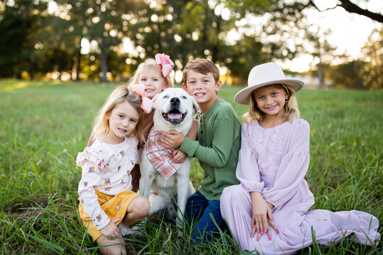 Sweet Siblings With Their Dog