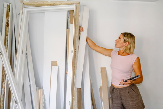 Architect checking materials during home renovation