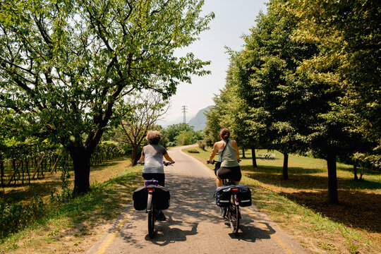Multigeneration bikepacking through vineyards in Italy