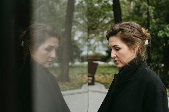 Reflective Moments in a Serene Park Setting