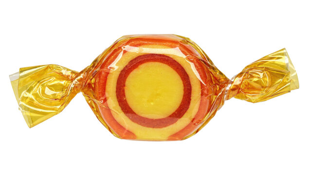 Round hard candy with yellow and red concentric circles wrapped in shiny transparent golden plastic foil isolated on a transparent background