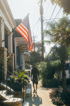 Man Walking in New Orleans Neighborhood