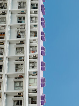 White Residential High-Rise Against Blue Sky