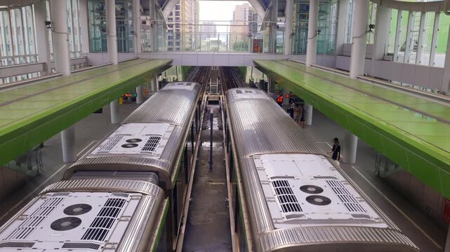 Taichung, Taiwan-6.20.2026: The Taichung MRT train climbs the ramp and enters the station