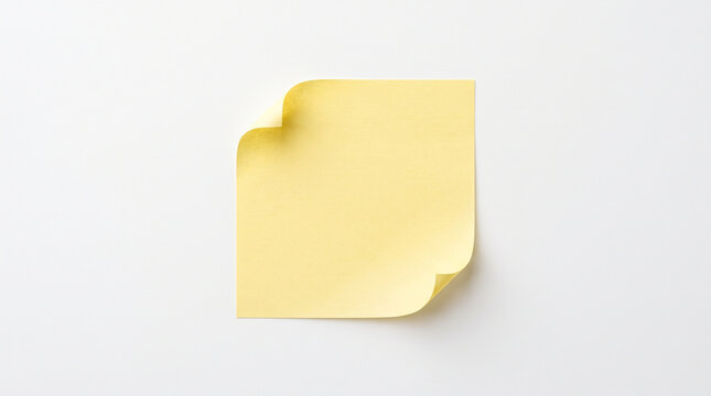 Single yellow sticky note with a curled corner isolated on a clean white background with copy space