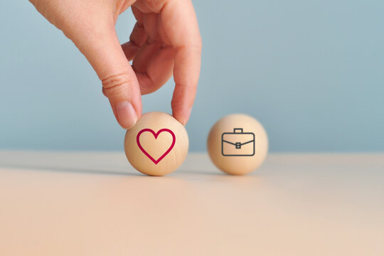 An image featuring a heart and business symbols, symbolizing the balance between relationships, love, and professional life.