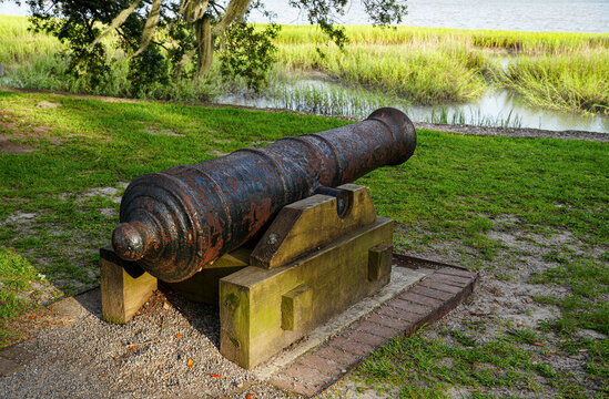 Historic coastal cannon overlooking a South Carolina salt marsh, combining military history with Lowcountry landscape.