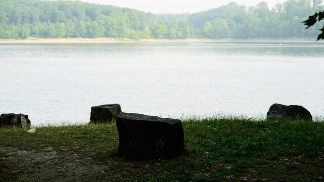 sittingstones at shore of boehnesee, germany
