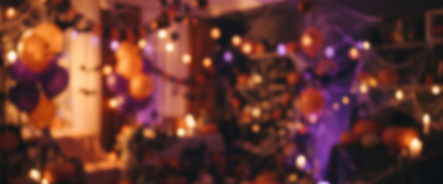 Festive Halloween party room with fully blurred pumpkins, decorations, glowing lights, and orange purple bokeh creating an energetic seasonal celebration background.