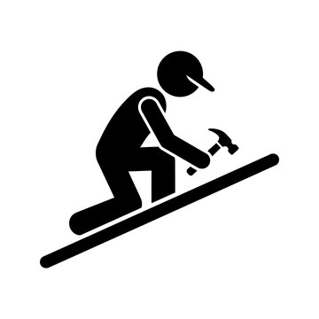 Black silhouette of construction worker with hard hat and hammer on slope building something important for industry projects.