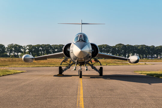 Vintage fighter jet on the runway