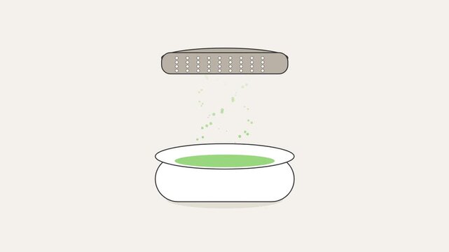 Sifting green powder into bowls with design