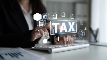 Business Professional Engaging with Digital Tax Symbols and Icons, Representing Modern Tax Filing...