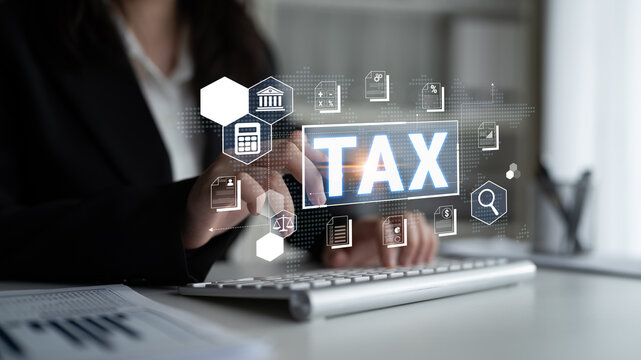 Business Professional Engaging with Digital Tax Symbols and Icons, Representing Modern Tax Filing and Financial Management Concepts Fluxor.