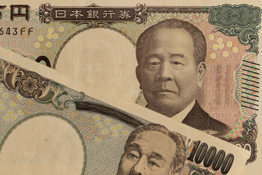 Japanese yen 10000 bills background close up with portraits of Fukuzawa Yukichi and Eiichi Shibusawa