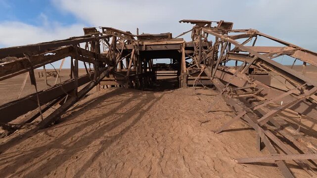 An abandoned, rusty oil rig on the Skeleton Coast, Namibia, Africa.