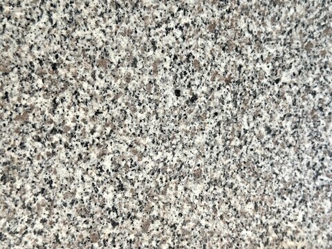 Light gray granite texture with dense black speckles