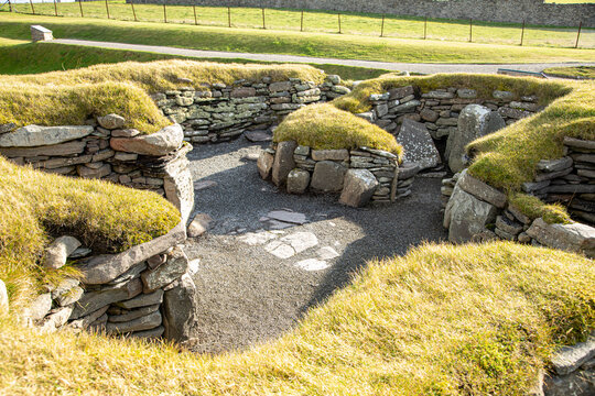 An example of the Bronze Age settlement showing  the small cells radiating off the central hearth area. This building was used by a blacksmith.