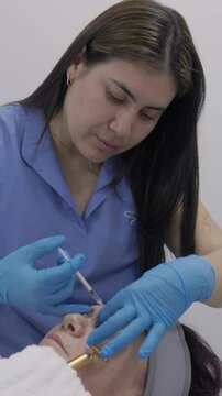 Botulinum toxin injection procedure by a professional in a clinic setting