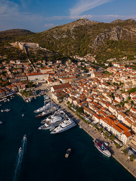 Aerial view of Hvar Town harbor, old town and Fortica fortress on Hvar Island, Croatia