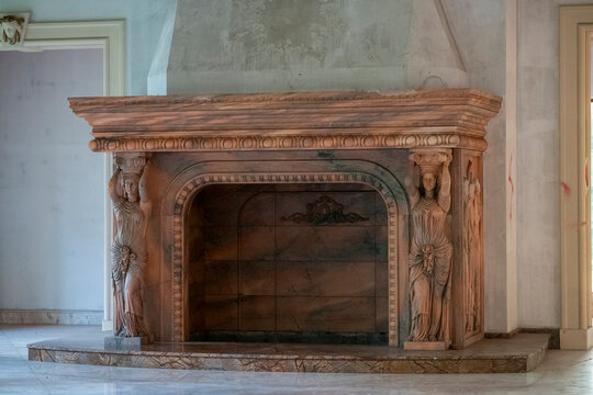 Abandoned luxury mansion interior with marble hall, ornate fireplace, swimming pool and glass facade