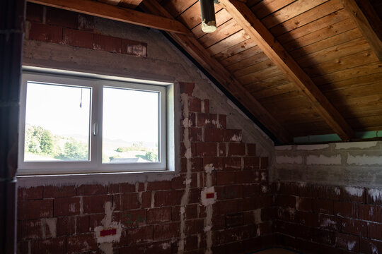 Timber roof construction seen from inside the attic of a new house