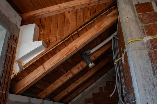 Timber roof construction seen from inside the attic of a new house