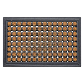 Isolated brown coir and rubber doormat with a patterned design on a