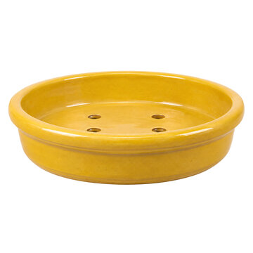 Isolated yellow ceramic soap dish with drainage holes, bathroom