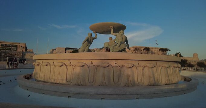 Panning View Around Triton Fountain at Sunset, Valletta, Malta