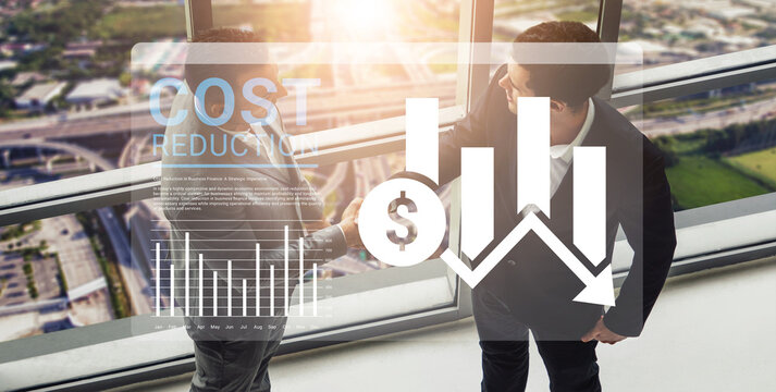 Professionals engage in a business meeting focused on cost reduction and growth strategies, featuring visual data analysis in a modern office setting with an urban landscape view. Ledger