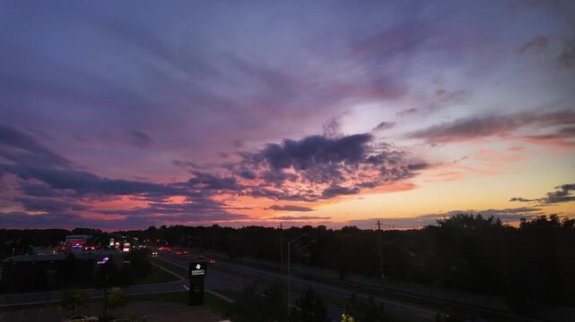Ottawa, Ontario, Canada - September 12, 2026: Sunset Timelapse Over City Road and Commercial District
