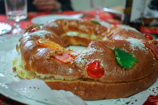 Macro close-up of candied fruits and decoration on a Roscon de Reyes cake