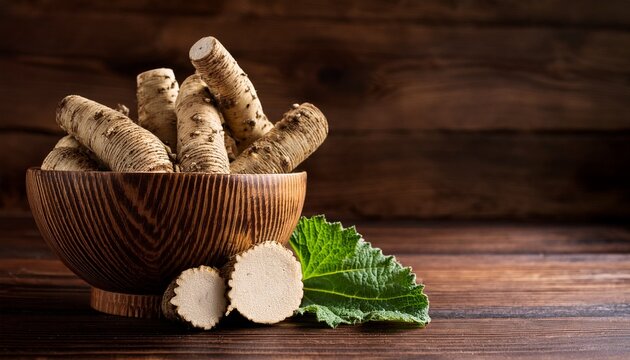 Fresh Burdock Root Or Gobo On Wooden Background
