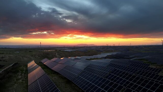 solar panel power station under sunset sky