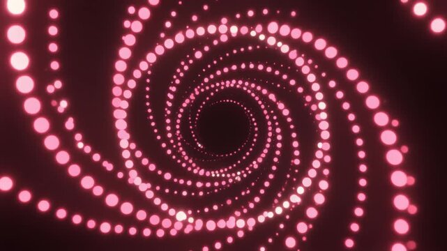 Pink glowing particle spiral vortex rotating on dark background