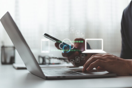 Cloud sync technology concept. Person use smartphone and laptop for data synchronization notification system secure file transfer communication integration and real time digital connection workflow.