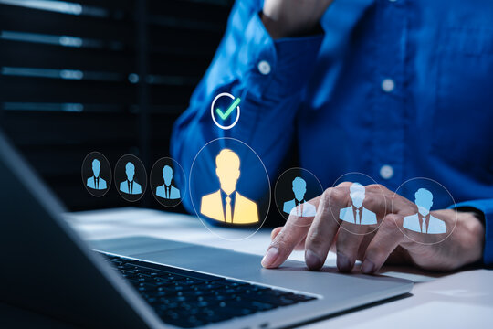 Candidate selection and recruitment concept. HR manager using laptop and applicant profiles to evaluate talent, qualified employees, hiring decisions, workforce planning, human resources management