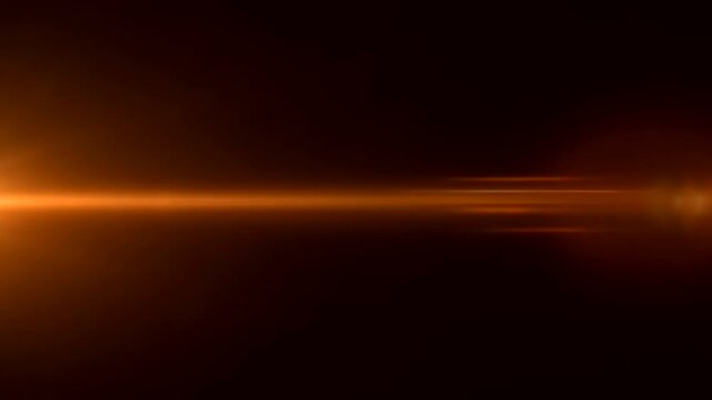 Abstract orange light streak effect with digital pixelation and bokeh.