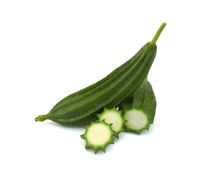 Angled luffa ridged gourd whole half and slice isolated on white background