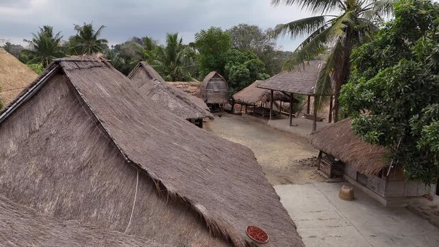Aerial view of Sasak Ende traditional village with thatched roof houses in Lombok Indonesia