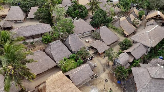 Aerial view of Sasak Ende traditional village with thatched roof houses in Lombok Indonesia