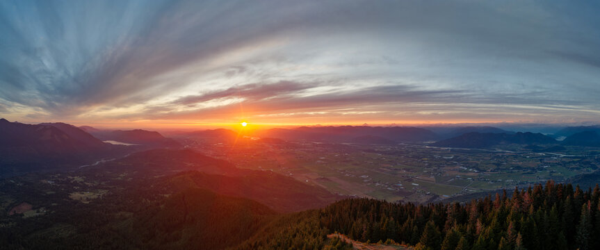 Sunset Panorama Over Elk Mountain and Chilliwack Valley, BC Canada With Forested Ridge and Farmland
