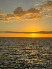 Fototapeta premium Dusk sky over ocean vertical