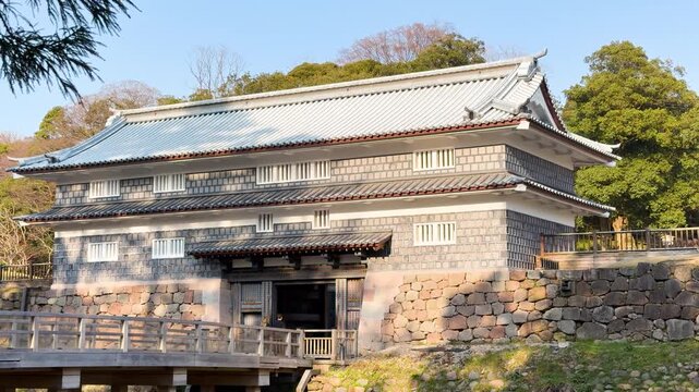 Kahoku gate entrance of kanazawa castle with stone walls and wooden bridge in ishikawa prefecture japan.